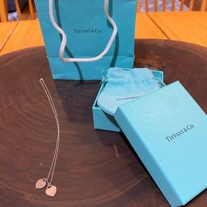 Womens Tiffany necklace with light pink heart